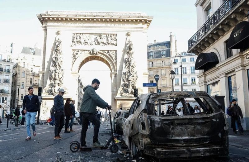 Anuncia Francia toques de queda tras disturbios y saqueos